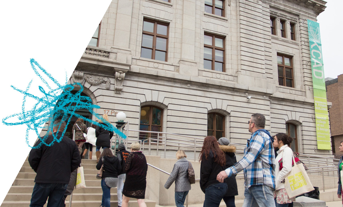 group of people walking into a building