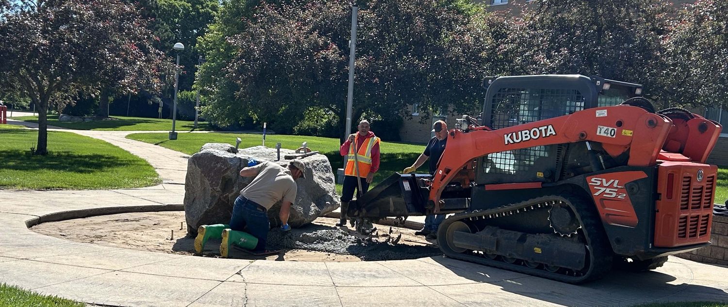 Crews working on removing an art piece