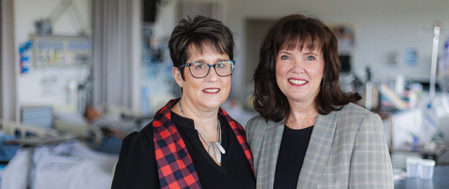 Portrait of Gustman and Johnson-Himes posing together