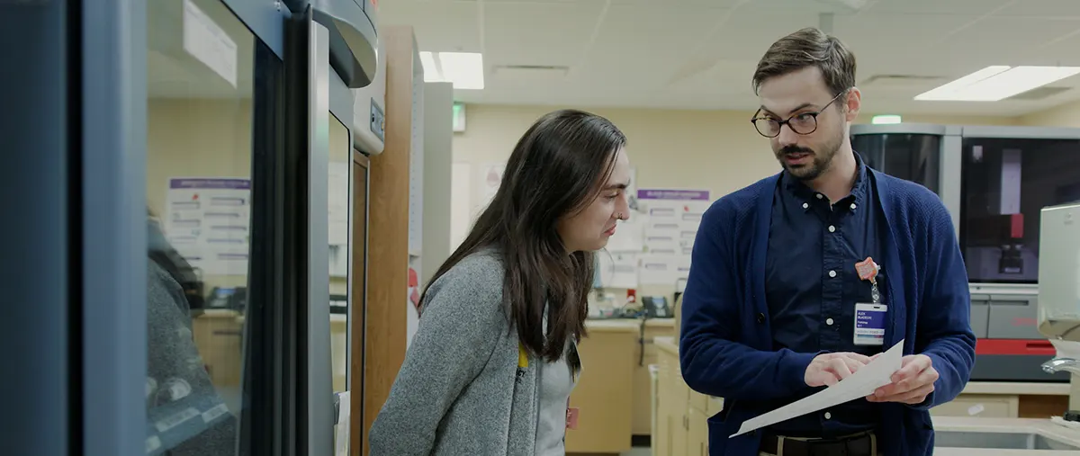 medical laboratory science alum teaching a student