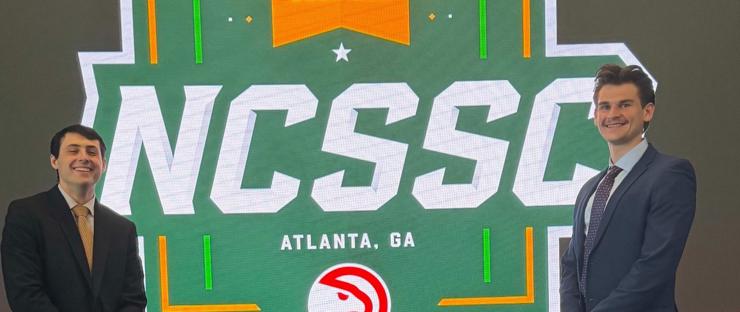 Benji Zorn and Ike Fillion standing on stage