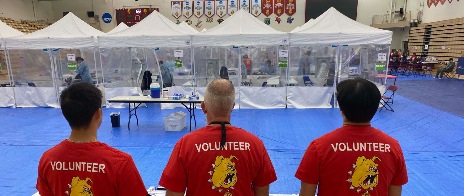 Ferris State volunteers overlooking RAM clinic setup