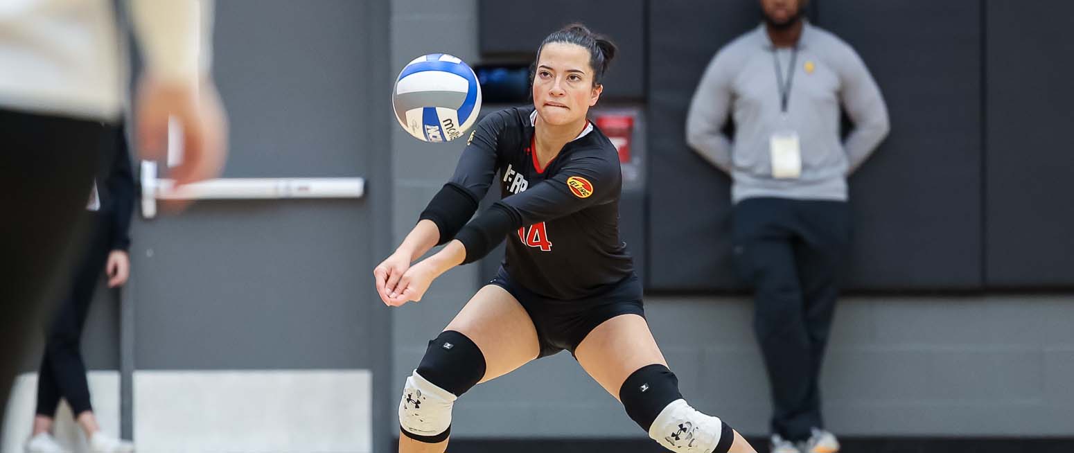 Action shot of senior Jasmine Wellet