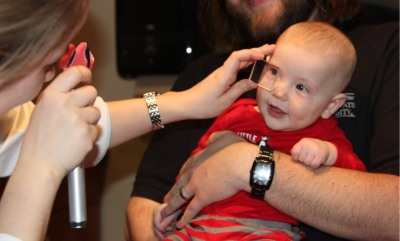 Infant receives an eye exam