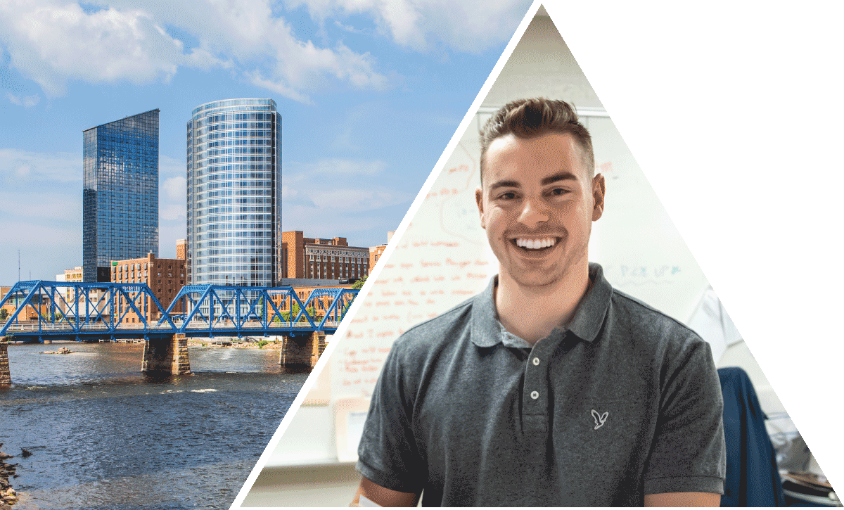 Student smiling. Grand Rapids landscape.
