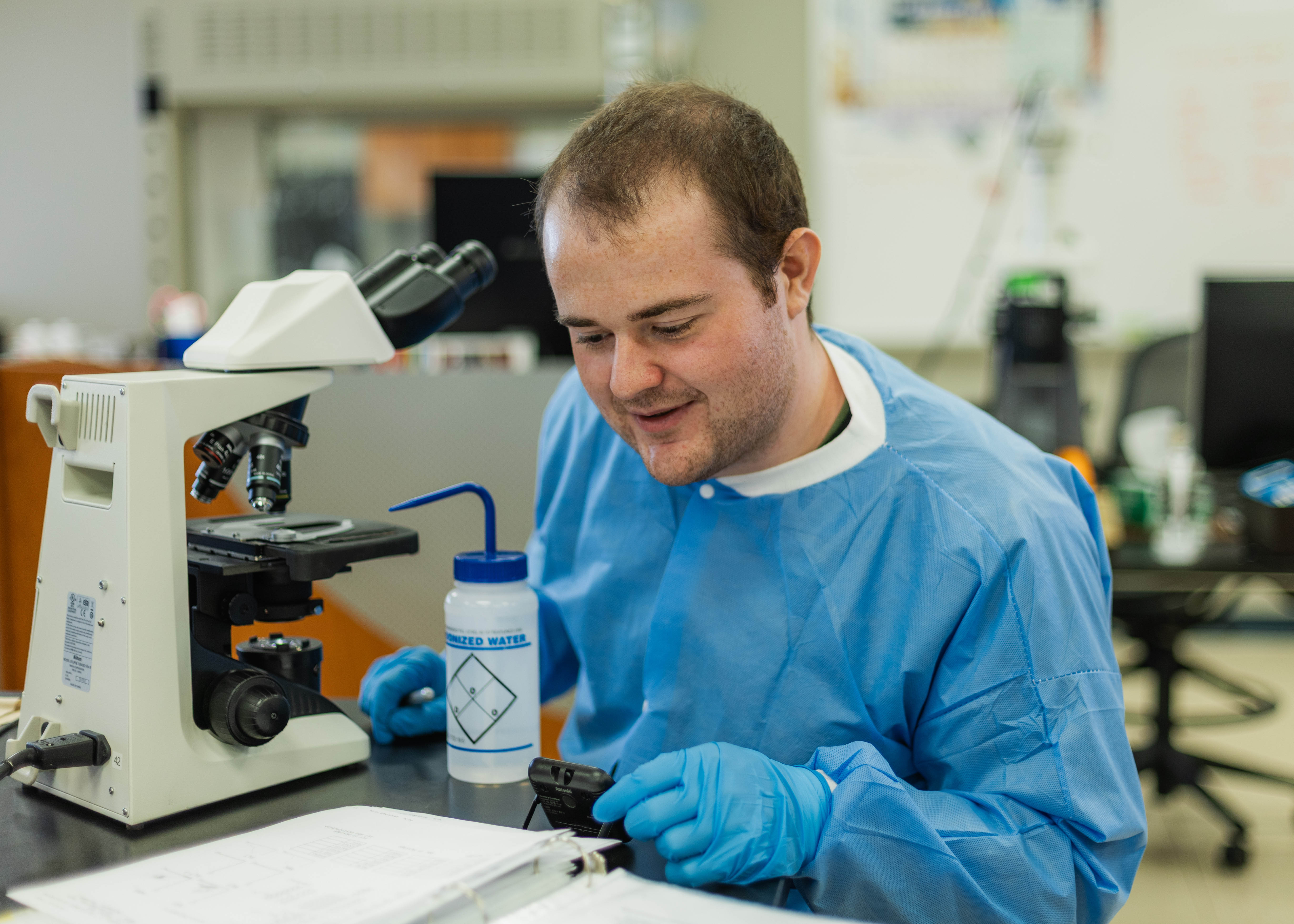 medical lab student in a lab working with medical devices