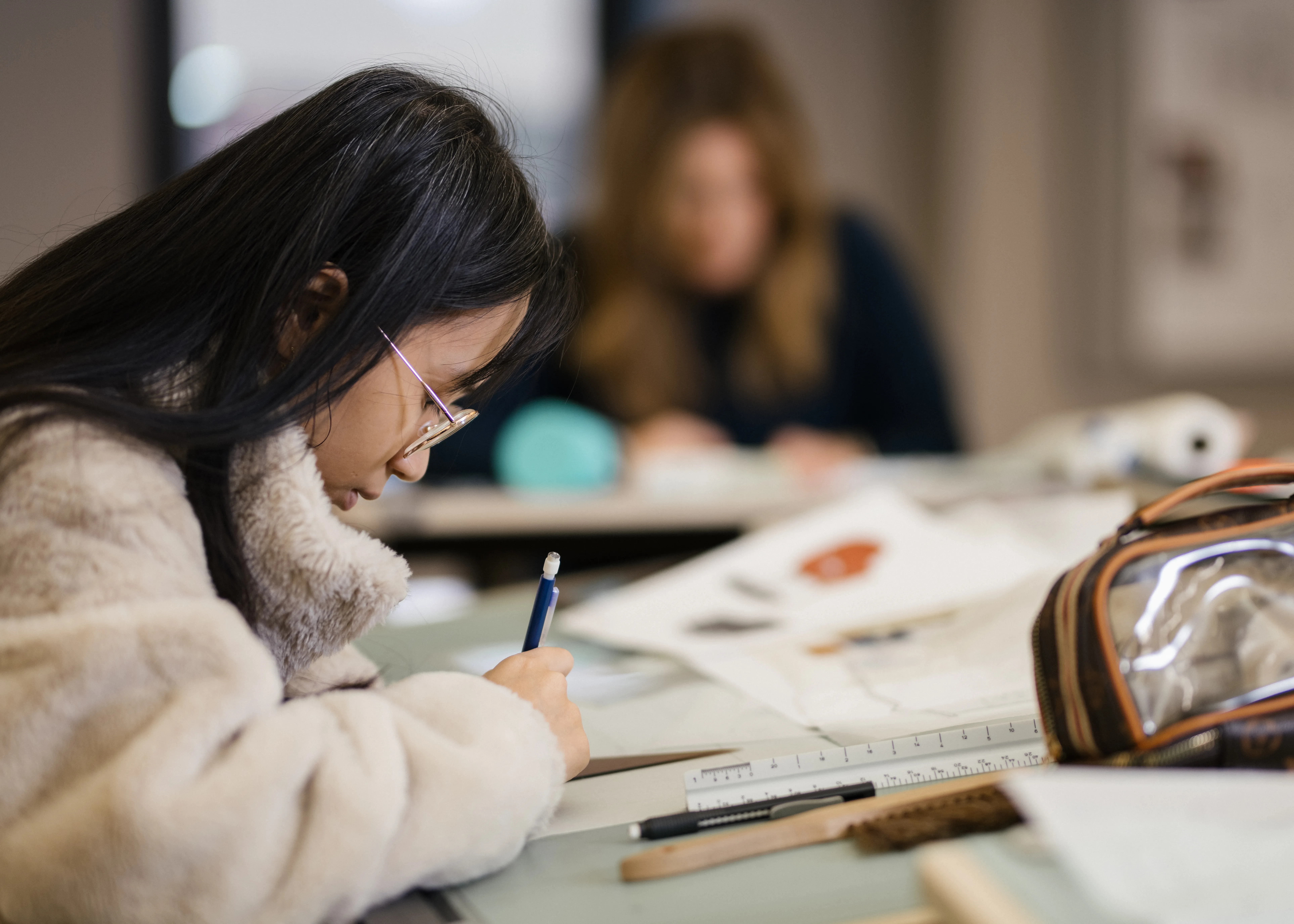 student working in classroom
