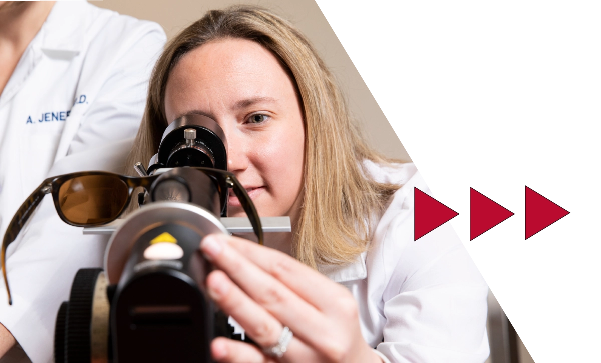 Ferris State Michigan College of Optometry faculty member working with glasses and equipment