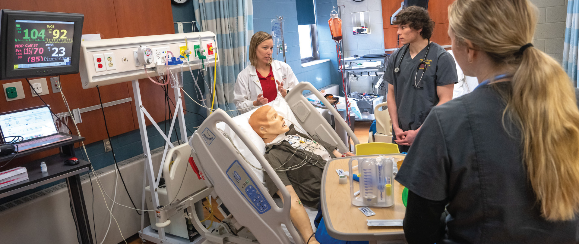 Students and professor working in nursing lab at Ferris State University